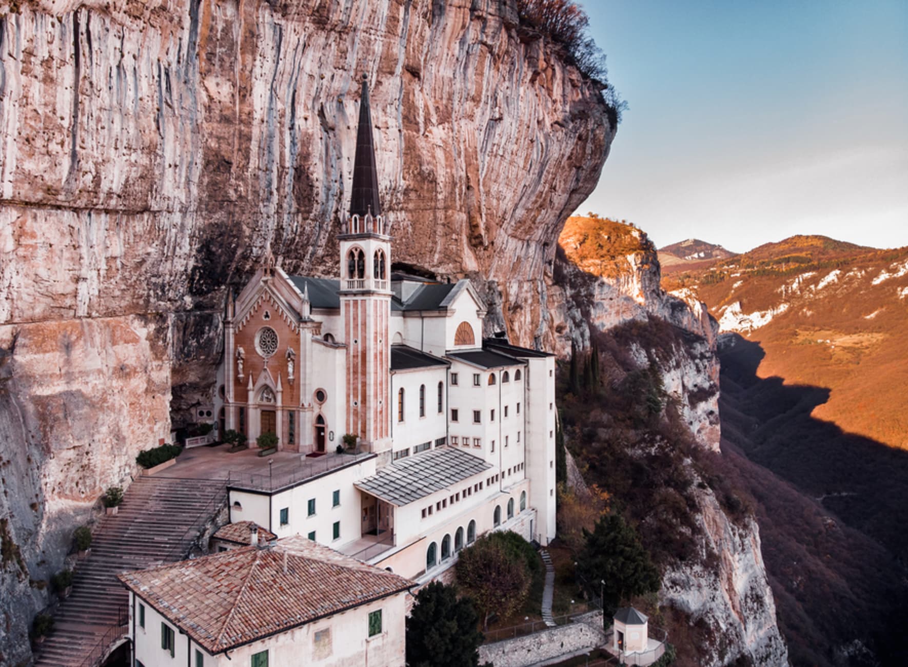 church on side of mountain italy